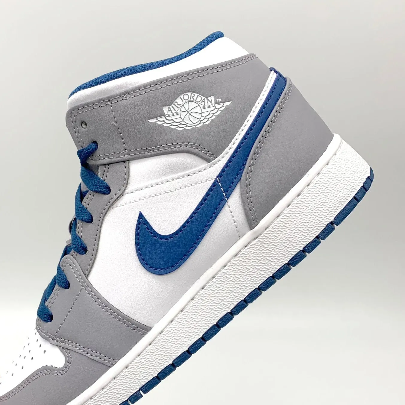 Jordan 1 Mid True Blue Cement