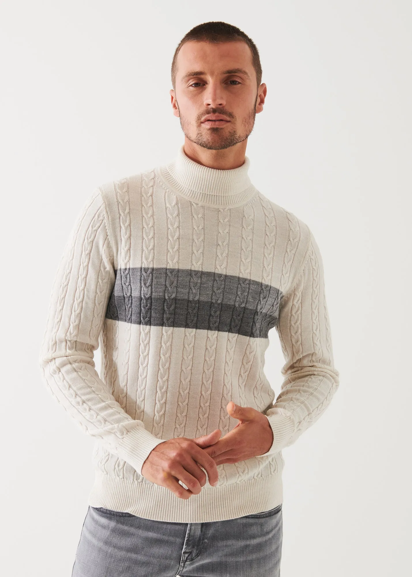 MERINO STRIPED CABLE KNIT TURTLENECK