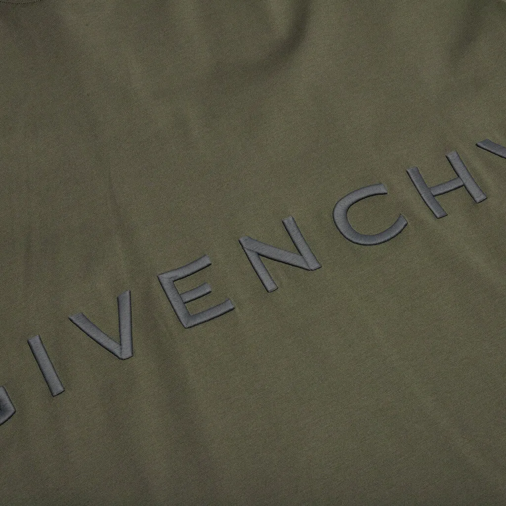 Heres an optimized title for the product: 

Givenchy Oversized Fit T-Shirt with Embroidery - Greyish Green

This title maintains key information while making the product attributes clear and easy to understand for potential customers.